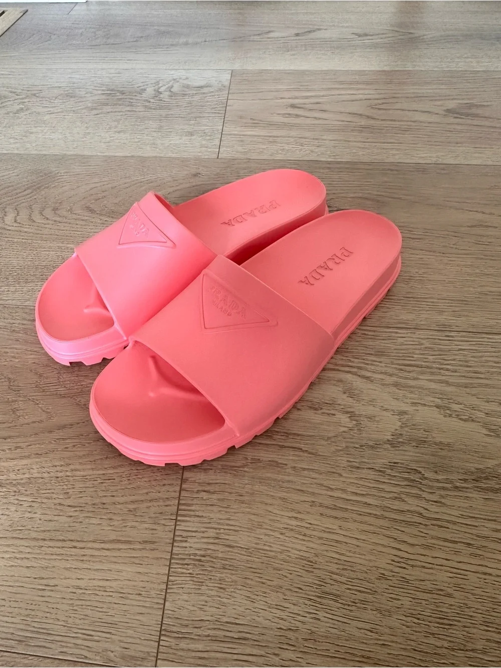 Prada triangle logo slides